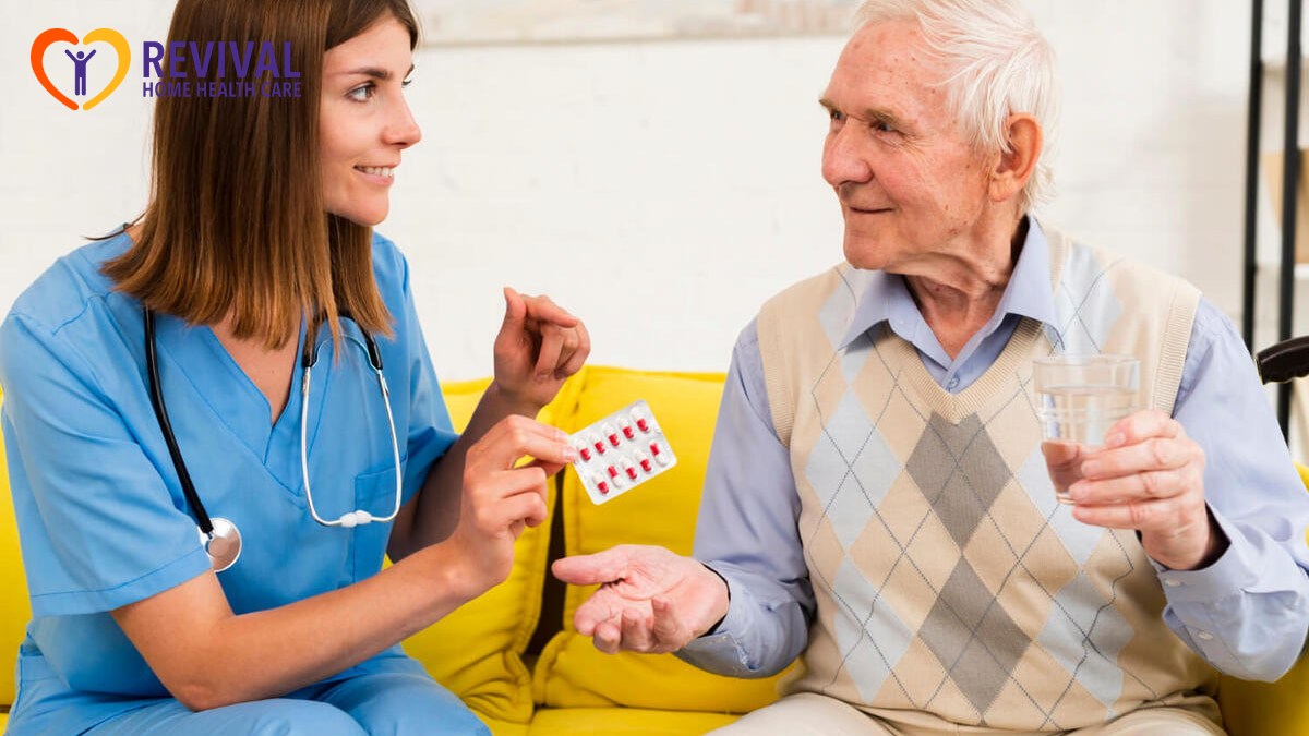 Nurse giving an old man his pills