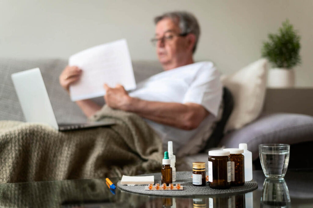 Medium shot blurry ill man on couch