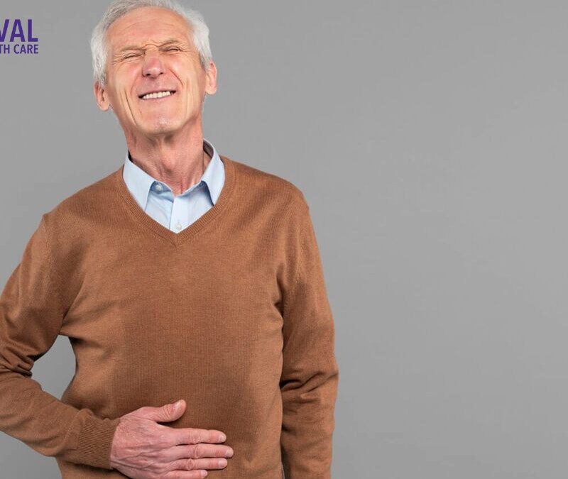 Man holding his hand on his stomach