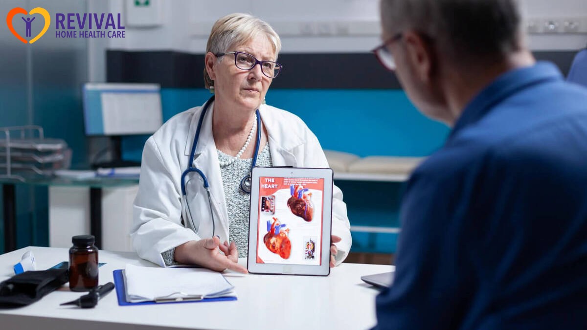Physician explaining cardiology diagnosis with image of heart organ on tablet